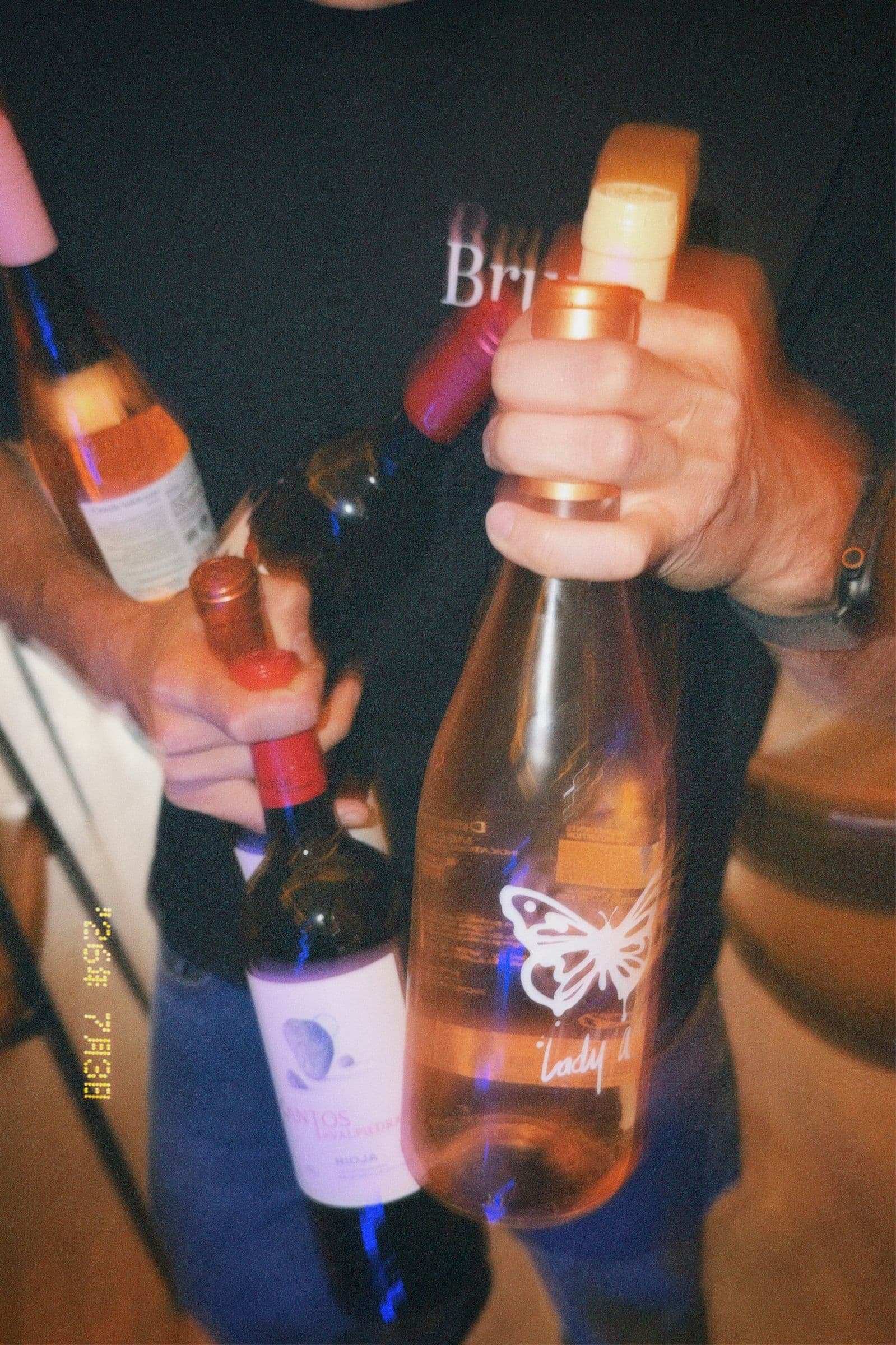 An armful of bottles